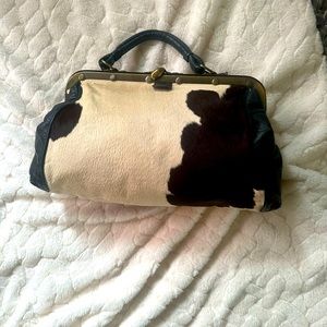 Vintage short haired cow hide doctors bag.  excellent condition, well made